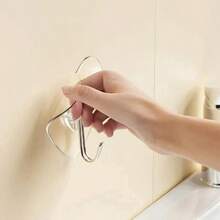 Móc treo không cần khoan, keo dính chắc chắn, thiết kế hình trái tim dày dặn, thích hợp cho nhà bếp và phòng tắm. Những chiếc móc nhựa trong suốt này cho phép treo đồ mà không gây hư hại và dễ dàng lắp đặt, rất tiện dụng. - Một kích thước phù hợp với tất cả - Xem 7