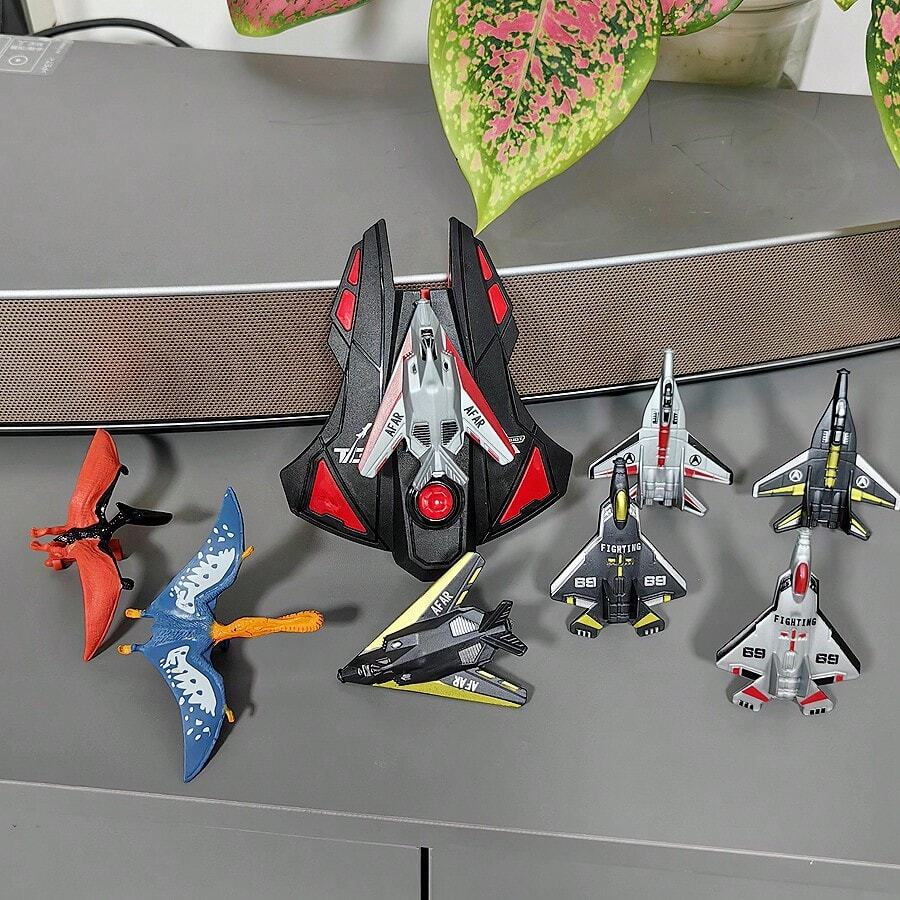 Juego de avión de catapulta para niños, lanzador negro + 6 aviones + 2 dinosaurios, juguete interactivo para exteriores, adecuado como regalo de cumpleaños para niños