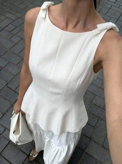 Buzzelle 优雅纯色蝴蝶结装饰无袖荷叶边下摆衬衫，夏季