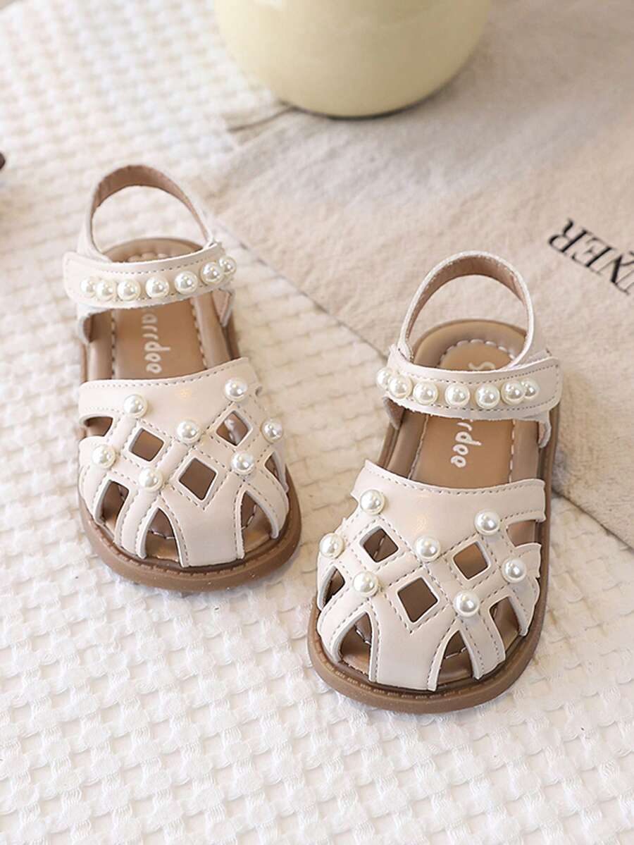 1 đôi dép xăng đan kiểu mới bảo vệ ngón chân cho bé gái, giày công chúa đính sequin thời trang, giày đi biển đế mềm, dép xăng đan kín mũi cho trẻ em, dép xăng đan mùa hè đơn giản và thanh lịch cho bé gái và trẻ nhỏ. - Màu be - Xem 1