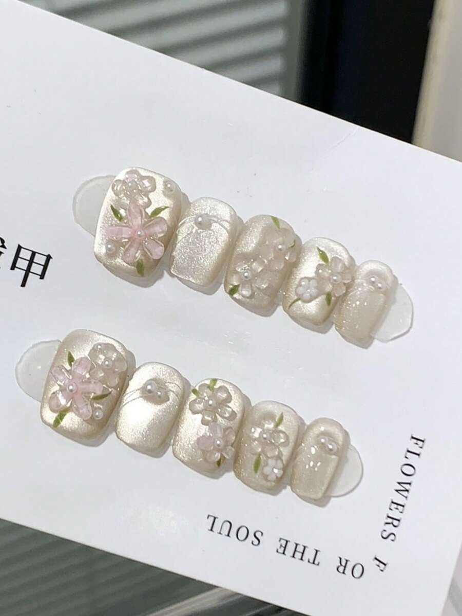 10片手工美甲贴纸，透明裸粉色猫眼3D立体花卉设计，优雅简约浮雕珍珠闪粉，适合通勤、送礼、女性、节日或日常佩戴，可移除可重复使用的按压式美甲贴片 - 香檳色 - 查看 1