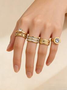 4枚时尚精致的不锈钢戒指，18K镀金镶嵌钻石，包括圆形、方形和不对称珍珠戒指，夸张几何造型黄金戒指套装。适合女性日常佩戴、约会、娱乐、婚礼、订婚、节日等场合，可作为礼物赠送，也可作为珠宝收藏。 - 4件 - 查看 7