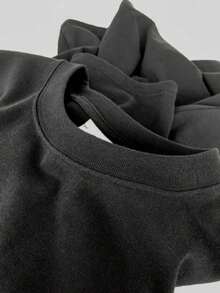 Figura de un fénix ardiente que renace de las cenizas con fuego en las alas y mirada poderosa símbolo de fuerza interior y transformación profunda camiseta de hombre casual cómoda algodón transpirable para uso diario moderno - Negro - Ver 5