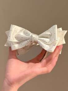 1个缎面波点蝴蝶结香蕉发夹，设计优雅，用途广泛，可扎高马尾，呵护秀发。 - 彩色 - 查看 5