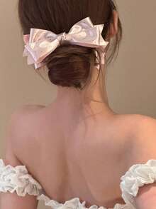 1个缎面波点蝴蝶结香蕉发夹，设计优雅，用途广泛，可扎高马尾，呵护秀发。 - 彩色 - 查看 3