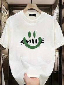 Camiseta de Hombre de Alta Calidad 100% Algodón, Cuello Redondo Casual, Manga Corta, Corte Regular, Esencial para el Verano con Diseño Gráfico "Smile", Blanca con Letras Verdes, Ligera y Transpirable para Atuendo Casual, Camiseta de Uso Diario |   Camiseta con Diseño Divertido |   Cómodo y perfecto como regalo para el Día del Padre, también es un regalo ideal para amigos y para tu pareja. - Blanco - Ver 1