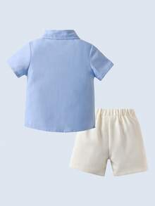 BOARNSEORL Bộ quần áo lịch lãm 2 món cho bé trai - Áo sơ mi ngắn tay kèm nơ và quần short màu xanh navy, thời trang và bảnh bao, thích hợp cho tiệc sinh nhật, sinh nhật lần thứ nhất, đám cưới, tiệc chiêu đãi. - trắng - Xem 7
