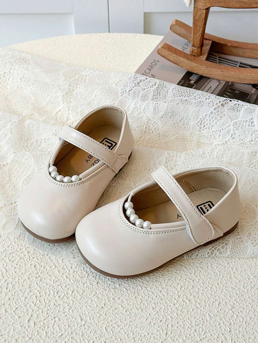 Giày da khoét lỗ cho bé gái, giày công chúa đính ngọc trai mùa xuân/thu mới, giày lười mũi tròn kiểu Hàn Quốc. - Màu be - Xem 1