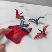 Lanzador de dinosaurio, juguete para niños de 3+ años - Lanzador manual de dinosaurio volador, diversión al aire libre y regalo perfecto para cumpleaños/Navidad - Rojo - Ver 3