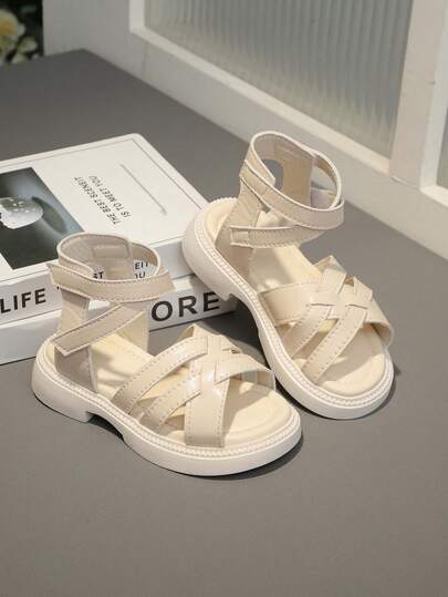 1 Pair Beige Infant/Toddler Girls' Flat Sandals, Solid Color PU Leather Woven Strap, Double Hook And Loop Closure, Simple Round Toe Design, Elegant & Fashionable Roman Beach Sandals, Suitable For 3-13 Years Old Girls, Daily, Casual, Party, Travel, 2026 Summer New Arrival