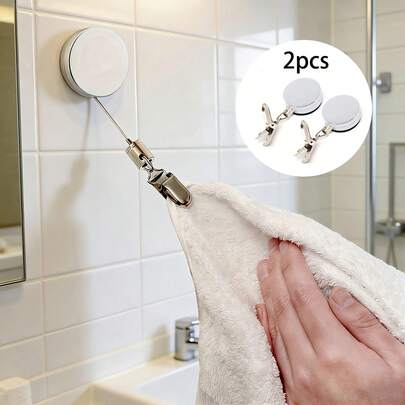 半件套。自动伸缩毛巾架，免钻孔自粘壁挂式，不锈钢钢丝绳，强力夹子，张力可调，浴室专用，安装简便，不伤墙面。优质不锈钢+强力粘合剂。自动伸缩浴室毛巾杆。简约实用风格。自动伸缩+免钻孔自粘+张力可调+强力夹持设计。适用于浴室毛巾晾晒和收纳。