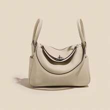 New Women's Handbag Made Of Genuine Leather With A High-End Feel, Crafted From Top-Layer Cowhide, Suitable Both Hand-Carrying And Shoulder-Carrying.It's A Niche, Large-Capacity, Simple And Stylish Bag Commuting, Offering A Of Light Luxury And Sophistication Women - 白色[銀扣] - 查看 1