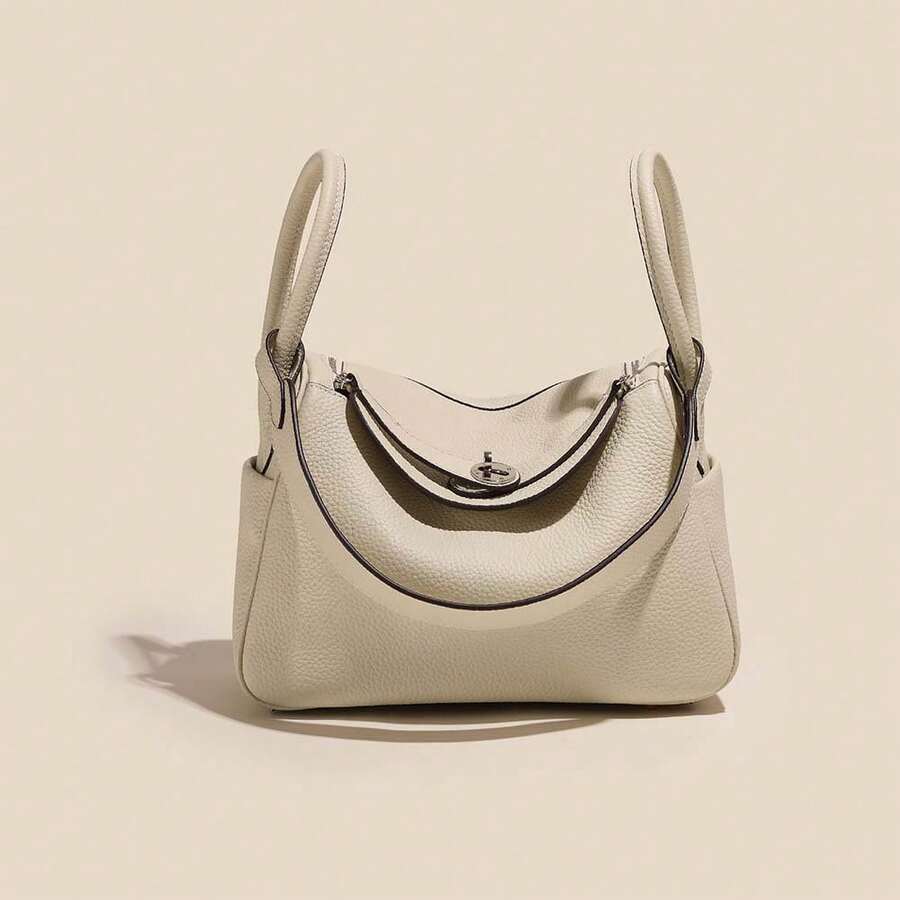 New Women's Handbag Made Of Genuine Leather With A High-End Feel, Crafted From Top-Layer Cowhide, Suitable Both Hand-Carrying And Shoulder-Carrying.It's A Niche, Large-Capacity, Simple And Stylish Bag Commuting, Offering A Of Light Luxury And Sophistication Women - 白色[銀扣] - 查看 1