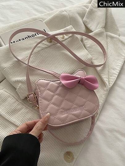 蝴蝶结装饰可爱猫咪造型迷你手提包，百搭流行的菱格纹绗缝个性化女士斜挎包，适合购物、装钱包、年轻女性、大学生、新人、白领等。非常适合办公室、大学、工作、商务、通勤、户外活动、旅行和郊游等场合。