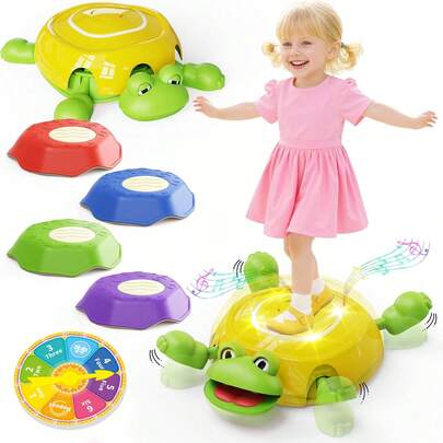 青蛙平衡石音乐玩具套装包含1个青蛙平衡平台、4颗彩色平衡石和一个游戏转盘，带有灯光和音效，是一款寓教于乐的感官玩具，适合3岁及以上男孩女孩。