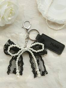 1个定制名字蕾丝蝴蝶结钥匙扣，个性化名字纯素皮革钥匙圈，配珍珠流苏蝴蝶结包包吊坠和钻石，可混搭，定制钥匙扣，包包配饰，时尚旅行配饰，送给朋友的礼物，情人节礼物 - 黑與白 - 查看 9