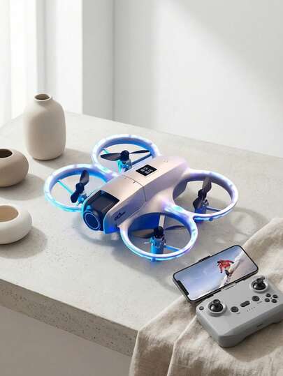 Dron cuadricóptero compacto con cámara, ideal para practicar vuelo recreativo en parques, patios amplios, excursiones, viajes, grabación de recuerdos y actividades de hobby, ya que permite capturar fotos o video aéreo y realizar maniobras controladas desde el mando o mediante conexión al teléfono según el modelo.