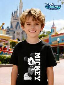 Boys' Casual Crew Neck T-Shirt With Classic Disney Mickey Mouse Print. The Front Features A Black And White Mickey Mouse With His Arms Crossed And The Word "MICKEY" Vertically. Suitable For Children Aged 4-12, Perfect For Theme Park Outings, Family Vacations, Everyday School Days, Outdoor Parties, And More. Sweat-Wicking, Breathable, Skin-Friendly, Comfortable, And Durable. The Cartoon IP Design Meets Boys' Daily Clothing Needs. Compatible With Wide-Leg Jeans, Cargo Shorts, Casual Sportswear, And Other Casual Wear. A Versatile Children's Clothing Item That Goes With Everything. - Black - View 1