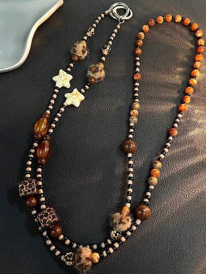 1个豹纹海星手机挂饰，手工串珠手机挂绳，相机防丢链，旅行手机挂绳，包包吊坠，钥匙扣，专业蓝牙耳机支架，女士节日礼物