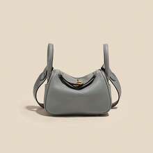 New Women's Handbag Made Of Genuine Leather With A High-End Feel, Crafted From Top-Layer Cowhide, Suitable Both Hand-Carrying And Shoulder-Carrying.It's A Niche, Large-Capacity, Simple And Stylish Bag Commuting, Offering A Of Light Luxury And Sophistication Women - 亞麻藍[金扣] - 查看 12