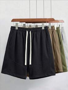 男士宽松休闲运动短裤，适合健身、篮球、训练、跑步、锻炼、街头、露营、海滩等场合，弹性腰带设计搭配抽绳，可调节松紧。 - 黑色 - 查看 4