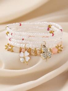6件套波西米亚简约优雅奢华手工串珠水晶四叶草吊坠弹力叠戴手链套装，适合女性参加派对、送礼、度假，是完美的礼物之选，四季皆宜，日常休闲佩戴。 - 四葉草/三葉草 - 查看 1