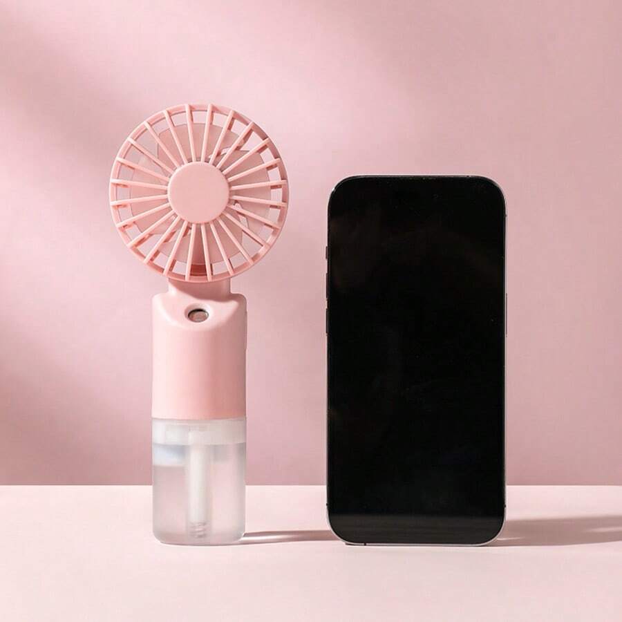 Mini ventilador de mano con pulverización, ventilador eléctrico portátil, ajustable a 2 velocidades, batería de 500mAh, ventilador de escritorio para el verano, humidificación y refrigeración, adecuado para interiores/exteriores, campamento, estudiante, recargable - Soporte de Mano - Ver 1