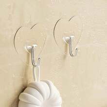 Móc treo không cần khoan, keo dính chắc chắn, thiết kế hình trái tim dày dặn, thích hợp cho nhà bếp và phòng tắm. Những chiếc móc nhựa trong suốt này cho phép treo đồ mà không gây hư hại và dễ dàng lắp đặt, rất tiện dụng. - Một kích thước phù hợp với tất cả - Xem 6