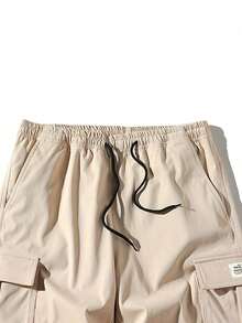 Quần short cargo nam kiểu dáng thường ngày, nhiều màu sắc, chất liệu polyester, dây rút eo, dây đeo vai điều chỉnh được, cạp chun co giãn, nhiều túi, lý tưởng cho phòng tập thể dục, có thể giặt được, quần short thể thao mùa hè, vải bền, quần jogger, món quà hoàn hảo cho bố và bạn trai nhân dịp tựu trường, Giáng sinh. - Màu be - Xem 7