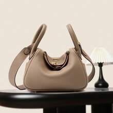 New Women's Handbag Made Of Genuine Leather With A High-End Feel, Crafted From Top-Layer Cowhide, Suitable Both Hand-Carrying And Shoulder-Carrying.It's A Niche, Large-Capacity, Simple And Stylish Bag Commuting, Offering A Of Light Luxury And Sophistication Women - 亞麻藍[金扣] - 查看 2