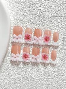 10件套春季主题亚克力美甲套装，包含3D蝴蝶结贴纸、手工渐变粉色花朵美甲贴片、白色指甲油，适合作为送给女性和女孩的美甲礼物，附赠美甲工具（1个果冻贴纸+1个指甲锉），三种尺寸：杏仁形、鸭嘴形、棺材形。 - 彩色 - 查看 2