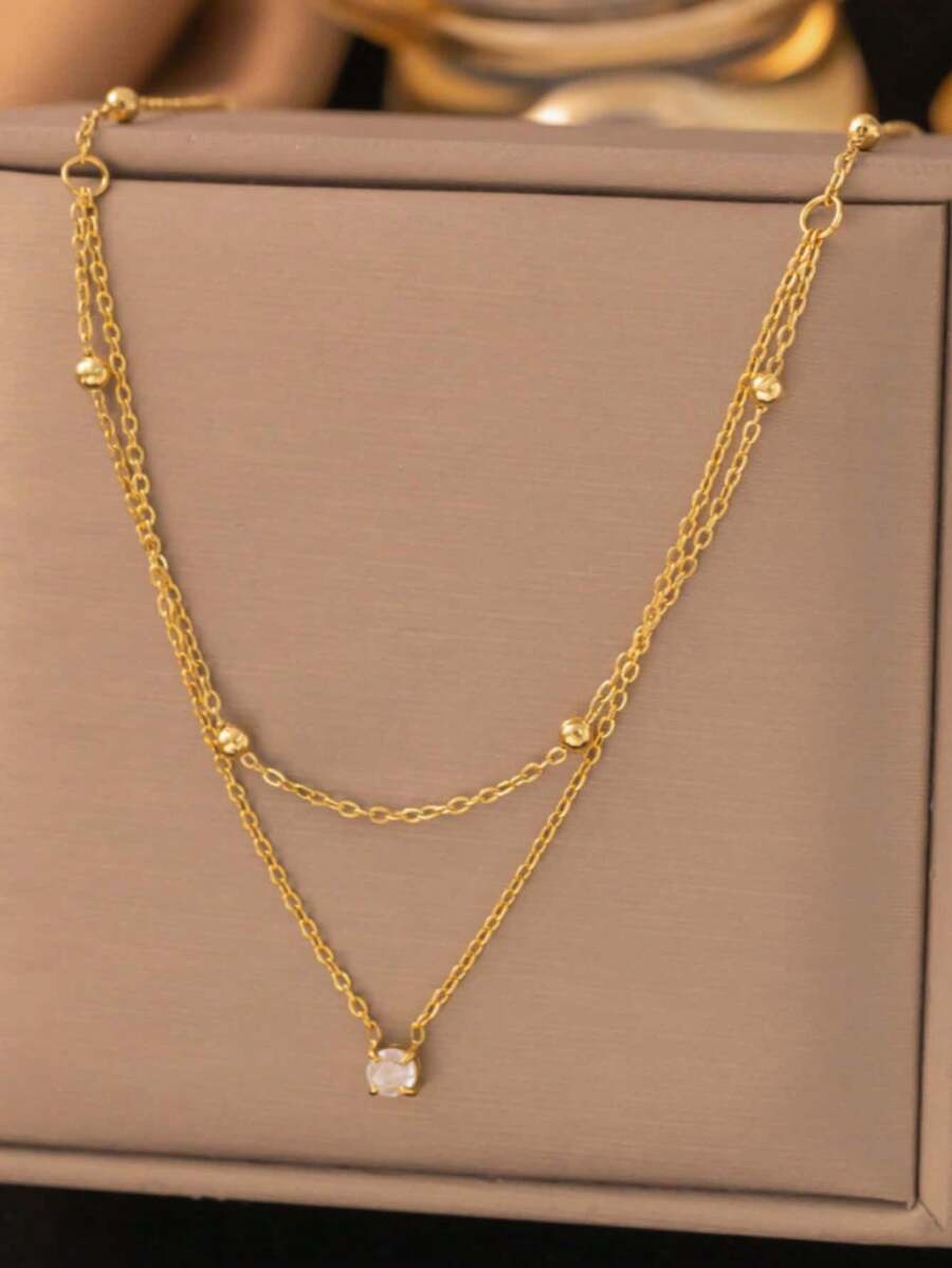 1件水钻吊坠双层链项链，时尚简约精致单颗水钻吊坠O形珠链多层项链，优雅小巧项链，适合女孩和女士佩戴（珠子数量随机） - 金色 - 查看 1