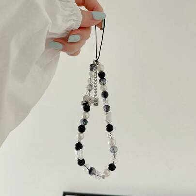 1 pieza Elegante cordón para teléfono con mariposa de cuentas en negro, blanco y gris, correa para funda de teléfono con flores de cristal