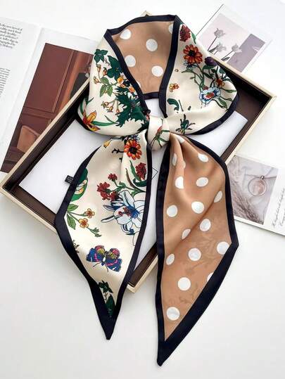 1条长款真丝围巾，双面印花，触感如丝般柔滑，适合女性在春、夏、秋季佩戴，可用作颈巾、衬衫/牛仔裤配饰或发圈。