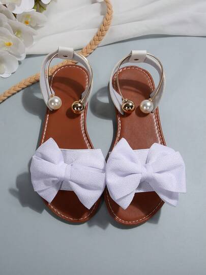 Sandal quai ngang đính nơ kim loại ngọc trai màu nâu kiểu retro mùa hè, dép bệt đế bằng thắt nơ dành cho học sinh, sandal đi bộ thường ngày.
