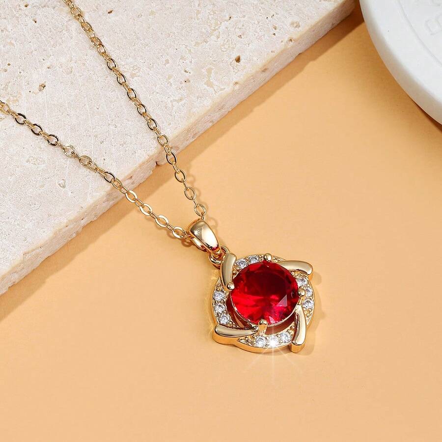 Dây chuyền vàng này được đính những viên kim cương nhỏ, tạo nên vẻ sang trọng. Nó hoàn hảo để đeo hàng ngày và là một món quà tuyệt vời cho những dịp đặc biệt. - Mặt dây chuyền thiên hà đỏ - Xem 1