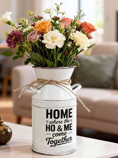 Vintage-Style White Iron Vase. The Off-White Base Color Complements The Warm-Hearted Slogan, Giving The Vase A Sense Of Gentle Belonging, As If It Were A Cozy Little Item Found At A Retro Market. Pair It With A Mixed Flower Bouquet To Create A Bright And Cozy Window Display, Or Use It With Dried Flowers To Evoke A Tranquil, Vintage-Inspired Ambiance, Suitable For Various Warm And Welcoming Settings.