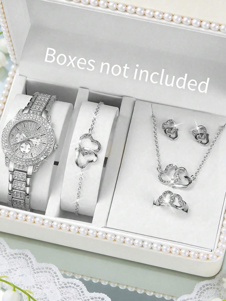 6 piezas Reloj de cuarzo de lujo elegante para mujer, conjunto de accesorios de lujo romántico para mujer (incluye reloj de cuarzo con números romanos, correa con diamantes, pulsera con corazón, collar con corazón, aretes con corazón, anillo con corazón). Centrado en tonos fríos y elementos con forma de corazón, el reloj presenta un bisel de doble capa con diamantes y un dial completamente cubierto de diamantes para realzar la sensación de lujo - Plateado - Ver 1