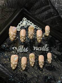 10件套粉色闪粉美甲套装，包含金色法式美甲、不对称金色线条手绘、3D透明蝴蝶、金属蝴蝶结、多颗白色珍珠饰品，芭蕾舞女孩风格，Y2K美甲套装，适合女士和女孩日常、派对、聚会（内含1瓶凝胶和1块抛光块） - 淺粉色 - 查看 3