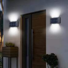 1/2个12颗LED凸透镜聚光灯户外太阳能灯套装，带光传感器、太阳能充电电池、按钮开关，白光/暖光可选，适用于美化花园装饰、营造节日氛围以及照亮围栏和墙壁。是庭院、阳台、花园、露营、钓鱼、小径和车库装饰的理想之选，也适用于情人节、斋月、音乐节、派对、圣诞节、万圣节、开斋节、宰牲节等节日照明。 - 12LED - 查看 4