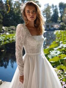 French Country-Inspired Long Sleeve Lace And Satin Wedding Gown With Subtle V Square Neck, Fitted Waist Belt, Full A-Line Skirt And Flowing Train, Elegant Bridal Dress For Garden Ceremony, Estate Wedding, Christmas, Halloween, Prom, Birthday Party & Special Occasions - This Timeless And Sophisticated Gown Is Ideal For The Bride's Wedding, Vow Renewal, Or Engagement Celebration, While Its Versatile And Refined Style Also Makes It A Stunning Choice For A Wide Array Of Formal And Festive Occasions Including Prom, Homecoming, Cocktail Parties, Anniversary Dinners, Birthday Galas, Graduation Ceremonies, Vacation Events, And Black-Tie Galas; Expertly Crafted With Clean Lines And Luxurious Fabric For All-Season Comfort And A Flattering Fit, This Dress Effortlessly Combines Understated Elegance With Dramatic Impact, Ensuring A Memorable And Photogenic Presence At Any Special Celebration. - trắng - Xem 2