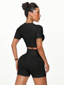 TCVC Women's Seamless 3-Piece Sportswear Set: Solid Color High Elasticity Sheer Resistant Short Sleeve Top + Sports Bra + Shorts. Supportive, Compressive, Removable Padded, Sexy Spaghetti Straps, Racerback Design. Cropped Tight Fit Tee, High-Waisted Slimming Shorts. Suitable For Running, Yoga, Gym, Outdoor Activities, Leisure - Black - View 5