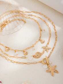 Set de 3 collares con inspiración oceánica bohemia que incluye concha, estrella de mar y caracol, collares asimétricos con cadena de piedras, de moda para fiestas, regalos y uso diario - Dorado - Ver 2