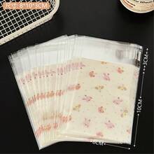 50个装自粘礼品袋，礼品包装用品，带自粘功能的礼品包装袋，小型卡纸OPP包装袋，简约透明自封包装袋，适用于礼品、珠宝包装、婚礼、派对、旅行、毕业典礼、生日、周年纪念、烘焙食品、圣诞节等场合。 - 多款 - 查看 9