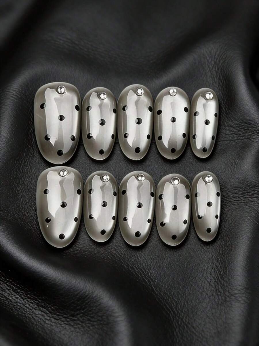 10片手工制作的短椭圆形美甲贴片，灰黑色波点玻璃珍珠猫眼钻石设计，纯手工制作，适合日常佩戴或作为节日礼物 - 黑色 - 查看 1