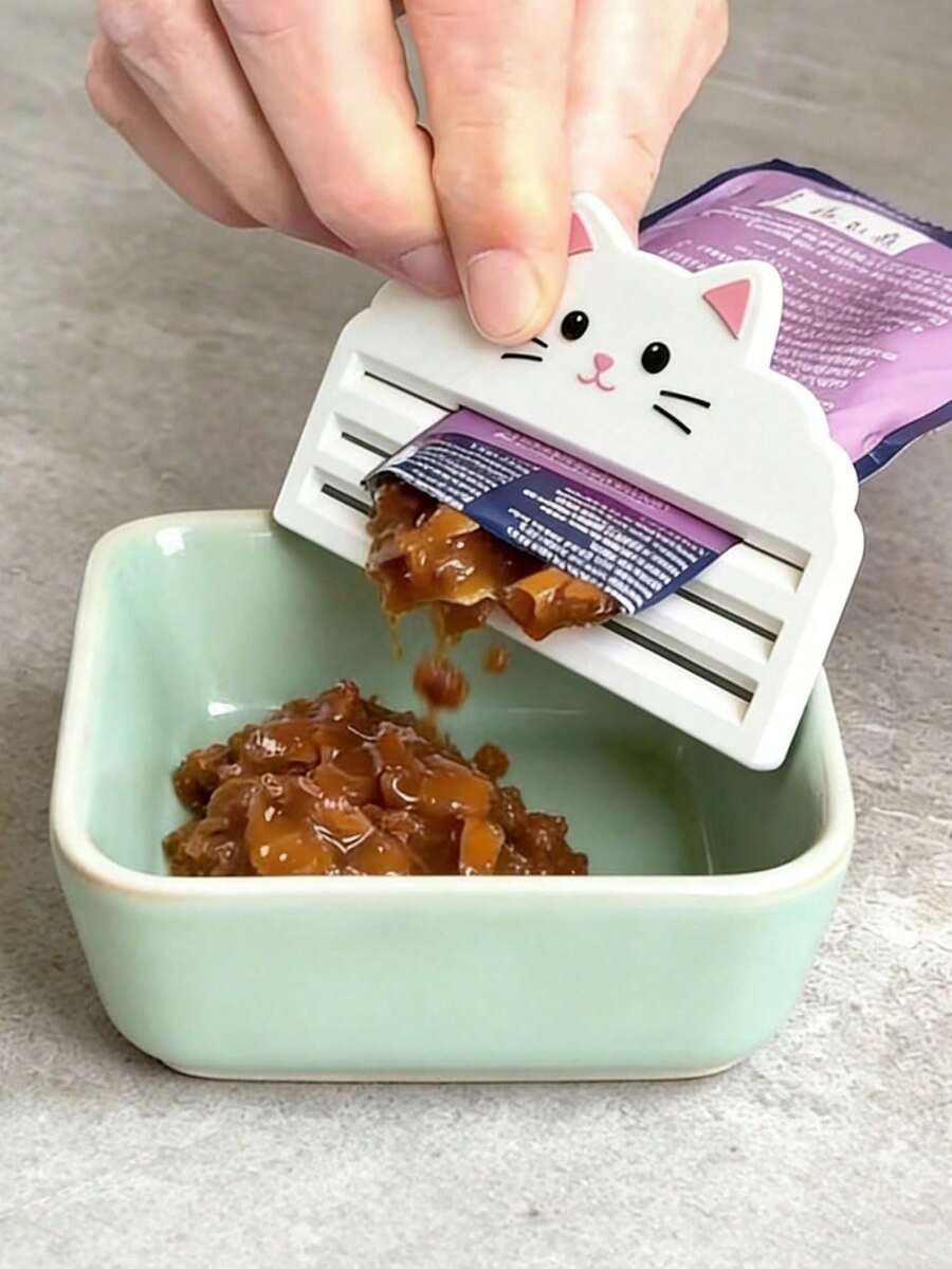 1 pieza Exprimidor de comida para gatos, eficiente para exprimir bolsas de comida para gatos, exprimidor portátil y multifuncional para comida de gatos, exprime eficazmente la comida para gatos de las bolsas, maximiza el aprovechamiento de la comida restante, diseñado para propietarios de gatos que valoran la alimentación limpia y el funcionamiento conveniente. Este exprimidor se adapta a diversas bolsas de comida para gatos, es fácil de limpiar y mantener la higiene.