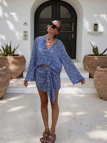 Bộ đồ nữ phong cách bohemian thường ngày thanh lịch gồm áo sơ mi cổ bẻ và chân váy midi thắt eo, thích hợp cho mùa xuân. - Màu xanh lam - Xem 1