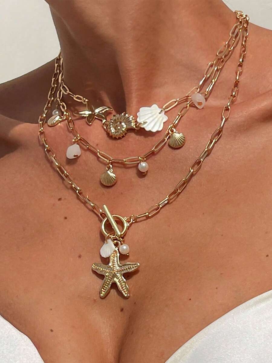 Set de 3 collares con inspiración oceánica bohemia que incluye concha, estrella de mar y caracol, collares asimétricos con cadena de piedras, de moda para fiestas, regalos y uso diario - Dorado - Ver 1