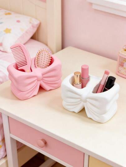1个北欧风不对称蝴蝶结化妆刷收纳架，专为化妆品收纳而设计，可用作化妆刷整理架，提升房间美感，适合女孩粉色房间装饰、婴儿房装饰、复活节礼物，提供节省空间的收纳方案。