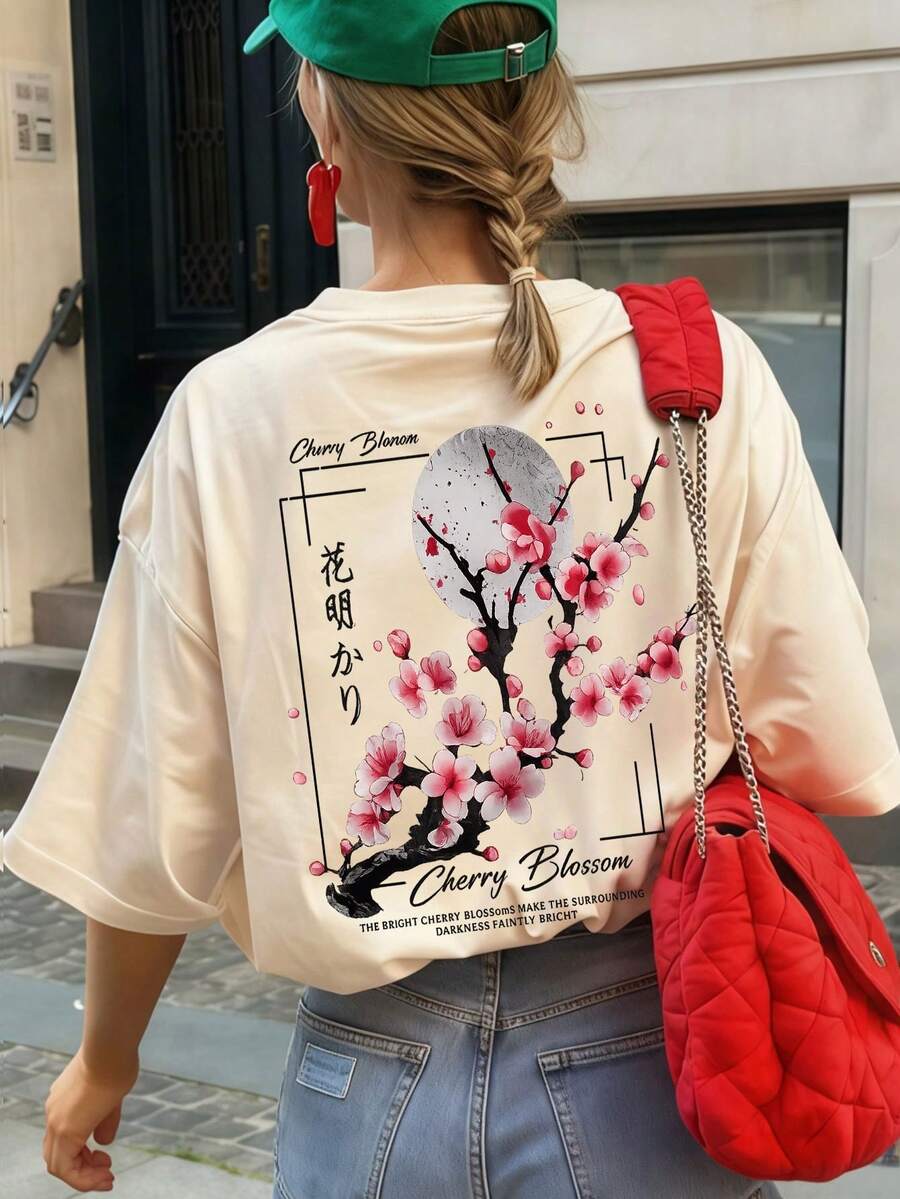 女士夏季圆领短袖T恤，樱花日式印花，宽松休闲百搭短袖上衣。适合办公室、外出、日常穿着、约会、派对、聚会、街头、嘉年华、音乐节、情人节、派对等场合。 - 杏色 - 查看 1
